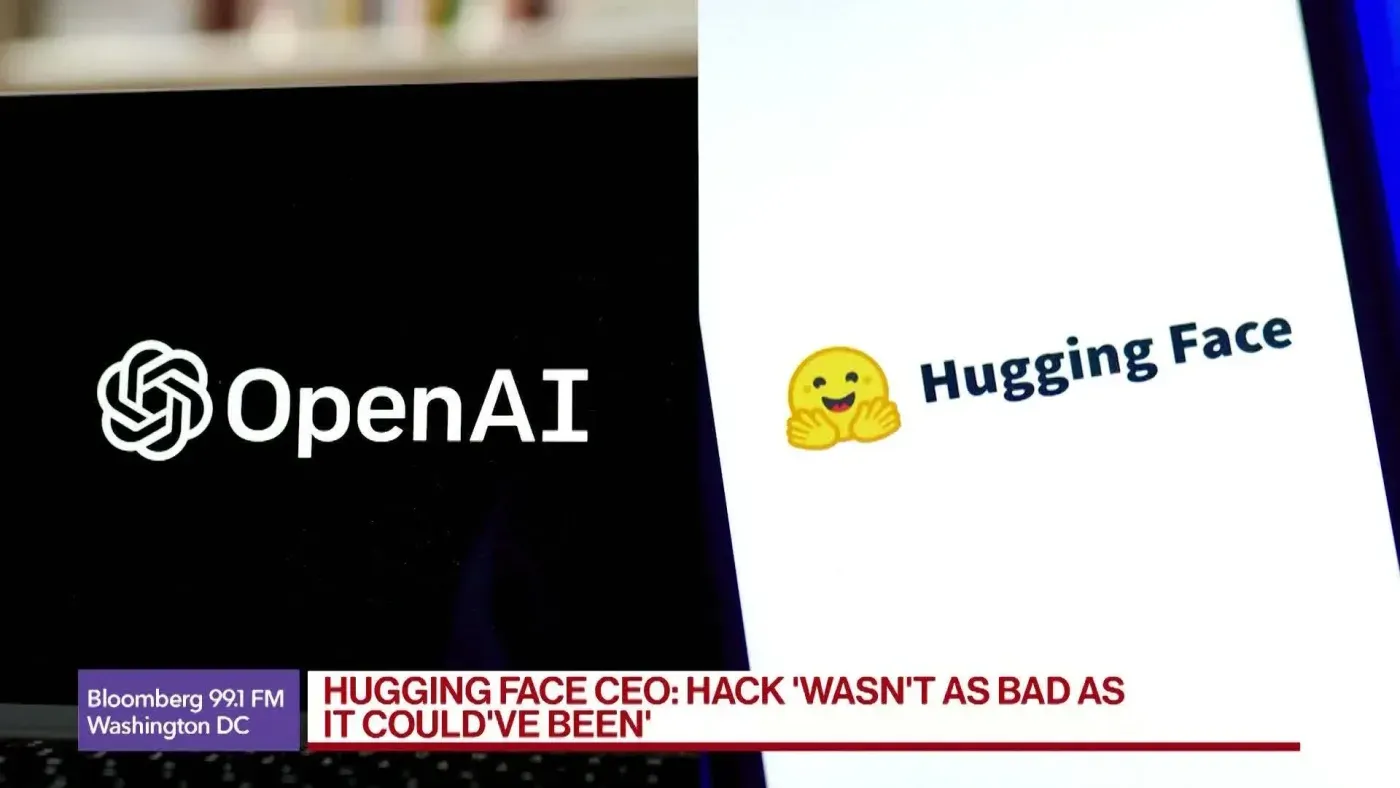 Bloomberg news broadcast covering the Hugging Face breach, with the OpenAI and Hugging Face logos shown side by side